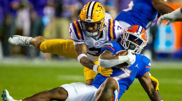 LSU safety Greg Brooks Jr. tackles Florida running back Trevor Etienne
